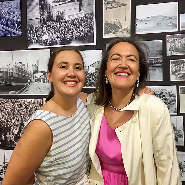 Dr Criena Fitzgerald and her daughter Harriet with some of the photographs displayed at the launch.